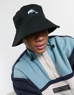 wide brim bucket hat in black with dolphin embroidery