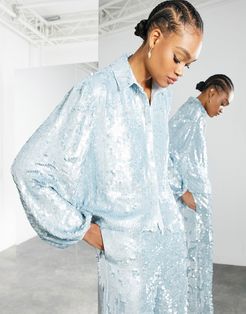 coordinating sequin shirt with blouson sleeves in pale blue