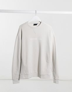 ASOS Unrvlld Spply oversized sweatshirt with rubber logo-Grey