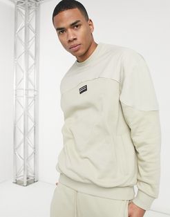 oversized sweatshirt in beige with nylon color block panels-Neutral