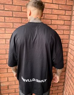 oversized t-shirt with Unrvlld/Supply back text print in black