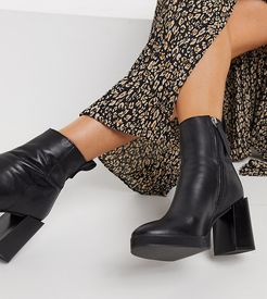 Exclusive Herington heeled boots in black leather