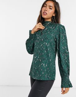 high neck top in green abstract spot