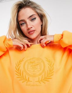 embroidered slogan oversized sweatshirt in orange