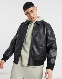 oversized faux leather bomber in black
