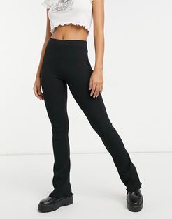 recycled cotton ribbed flare pant with lettuce hem in black