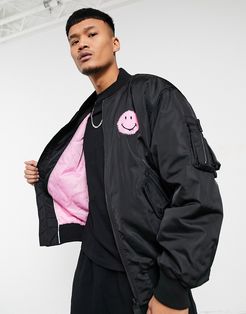 Smiley bomber jacket in black