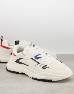 sneakers in white with red and navy detailing