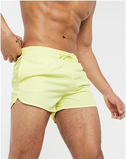 swim shorts in pastel yellow