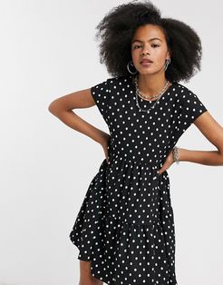 tiered polka dot smock dress in black