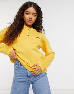 button detail sweater in yellow