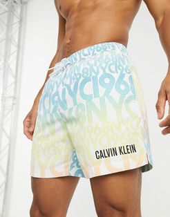 medium length swim shorts in typo print-Multi