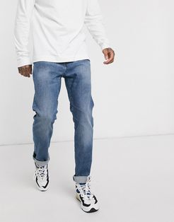 ED80 slim fit jeans in washed blue denim