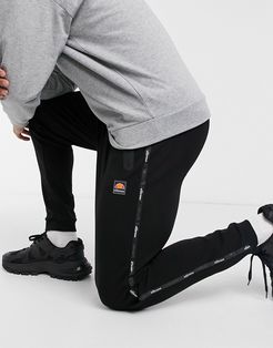 Linford logo taping sweatpants in black