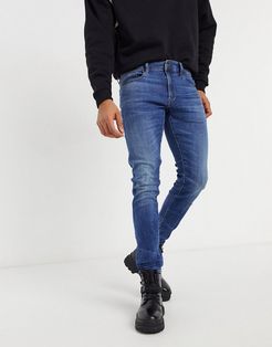 3301 deconstructed skinny fit jeans in medium indigo aged-Blues