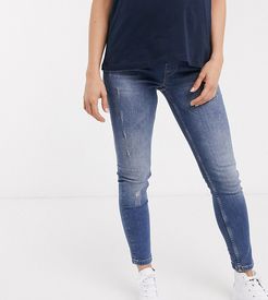 over-the-bump skinny jeans in light wash blue