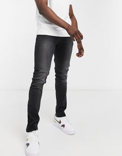 slim tapered jeans in black acid wash