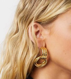 twisted doorknocker earrings in gold plate