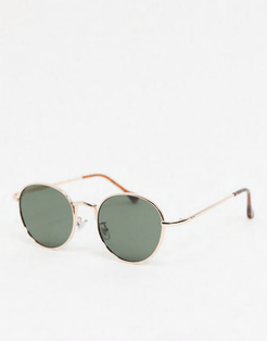 round sunglasses in gold