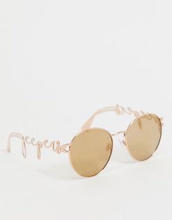 round sunglasses in gold