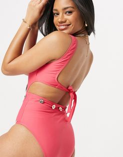Boardwalk Sass cutout swimsuit with gold buttom detail in red