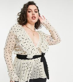 ruffle blouse with contrast black tie waist in cream polka dot