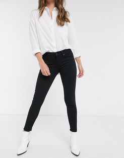 711 mid rise skinny jeans-Black