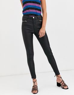 coated skinny jean with zip detail in black