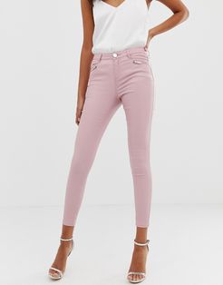 coated skinny jeans in pink-White