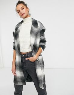 boxy straight coat in black and white plaid
