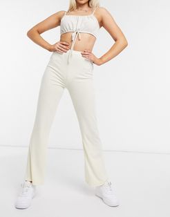 ribbed flared pants in cream-Brown