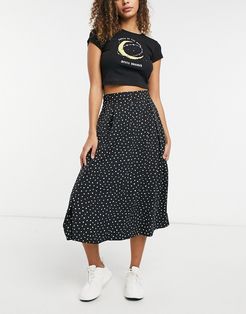 Sigrid button closure midi skirt in black dot print