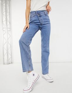 asymmetric button detail straight leg jeans in mid blue-Blues