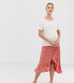 side button ruffle midi skirt in red floral pattern