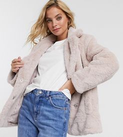 faux fur coat in pale pink