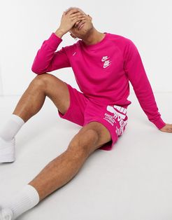 World Tour Pack graphic crew neck sweatshirt in pink