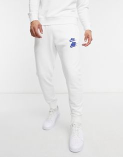 World Tour Pack graphic cuffed sweatpants in white