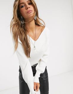 ribbed sweater with v neck in cream-White