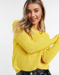 knitted long sleeve crew neck sweater in mustard yellow