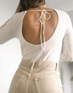 long sleeve top with open back in cream