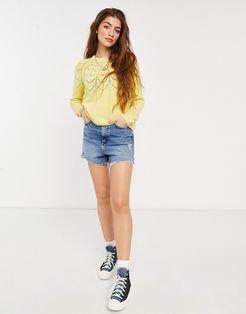 sweater with knitted pattern in yellow