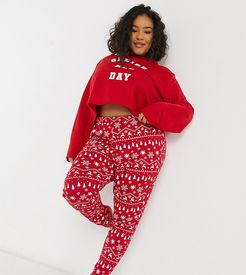 pajama pants with Christmas print in red