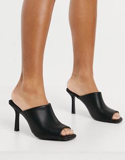 mid heeed mules in Black