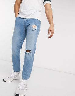 Kick cropped fit jeans with knee rip in blue fade-Blues