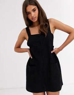 Verona dress with front patch pocket in black