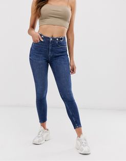 high rise saddle skinny jeans in mid wash-Blues