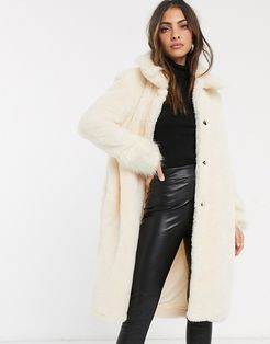longline faux fur coat in cream-White