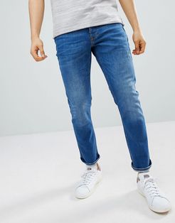 slim jeans in mid wash blue-Blues