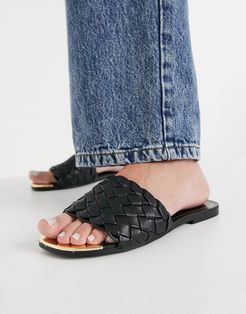 woven flat sandals in black