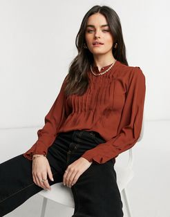 pleat detail high neck blouse in red